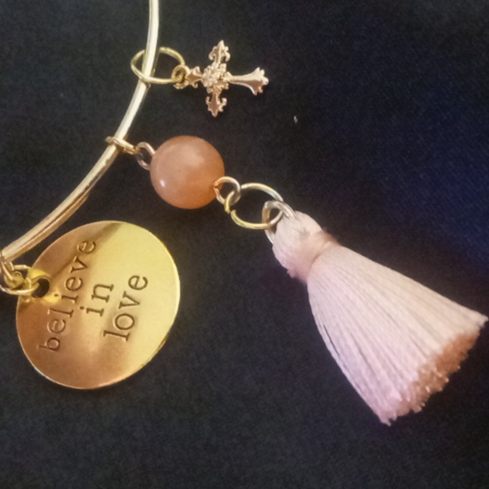 Tassel bangle bracelet coral color beads cross with crystal.